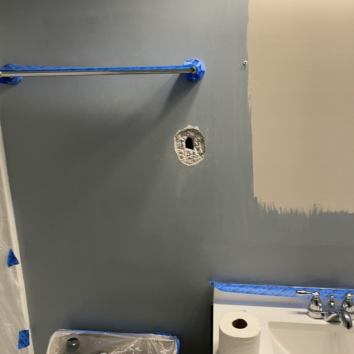 Old patch on wall that was bubbling and failing