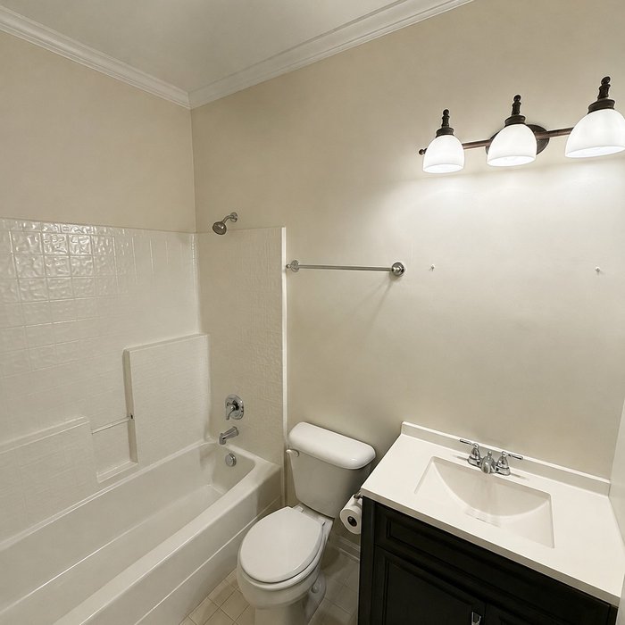 Finished bathroom wall after repair and repaint